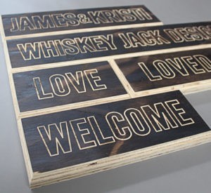 Whiskey Jack - torched plywood with lightly engraved lettering