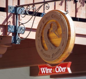 Goose Ridge Winery - 3" thick cedar with laser cut steel painted bronze and hover mounted off wood