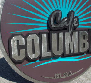 Cafe Columbia - multimedia sign layers of MDO plywood and grinded steel