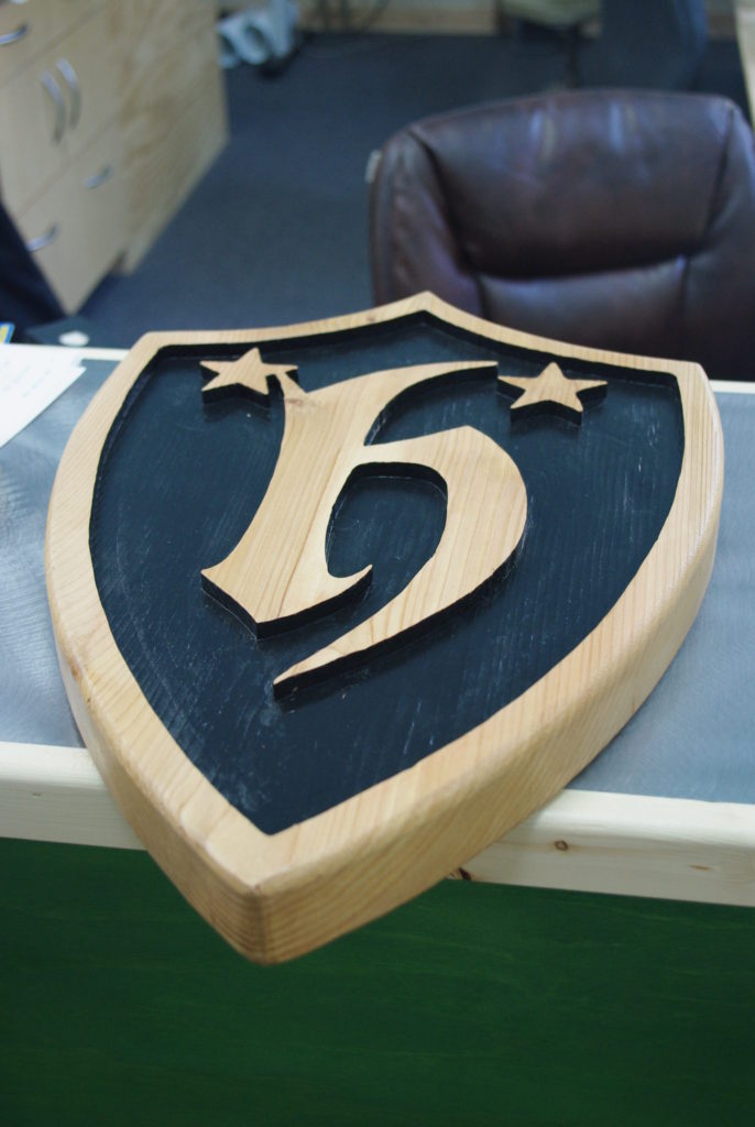 H sign - CNC router carved cedar with recessed area painted black