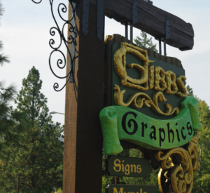 Gibbs Graphics - vertical cedar boards, MDO green background, 3D raised lettering and ribbon