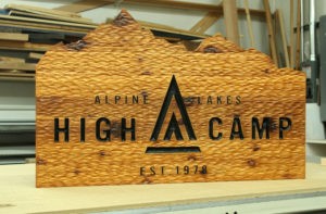 High Camp - cedar with chisel texture background, v-carved lettering