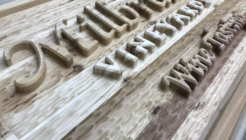 cedar sign carved by cnc router
