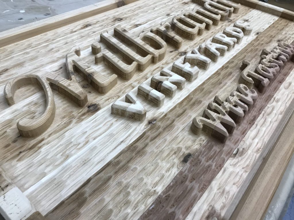 cedar sign carved by cnc router