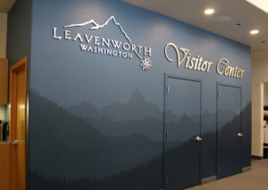 Visitor Center sign on wall