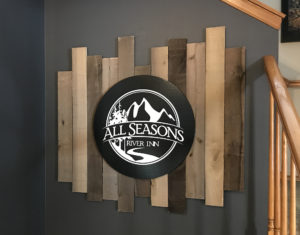 round sign on rustic wood plank background