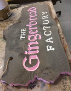 Rustic sign with carved letters