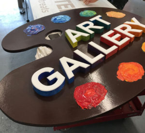 Art Gallery sign in shape of painters palette