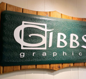 Gibbs Graphics - wooden sign with green texture