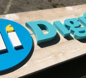 Hi Digital - sign with raised letters on white washed wood
