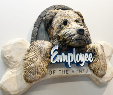 Employee of the month sign with 3D carved and sculpted dog and bone