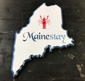 Sign in the shape of Maine