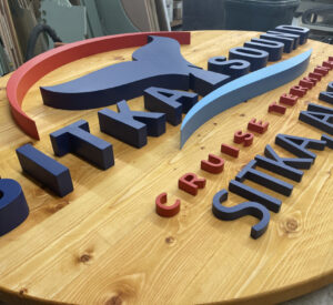 wooden sign with raised letters