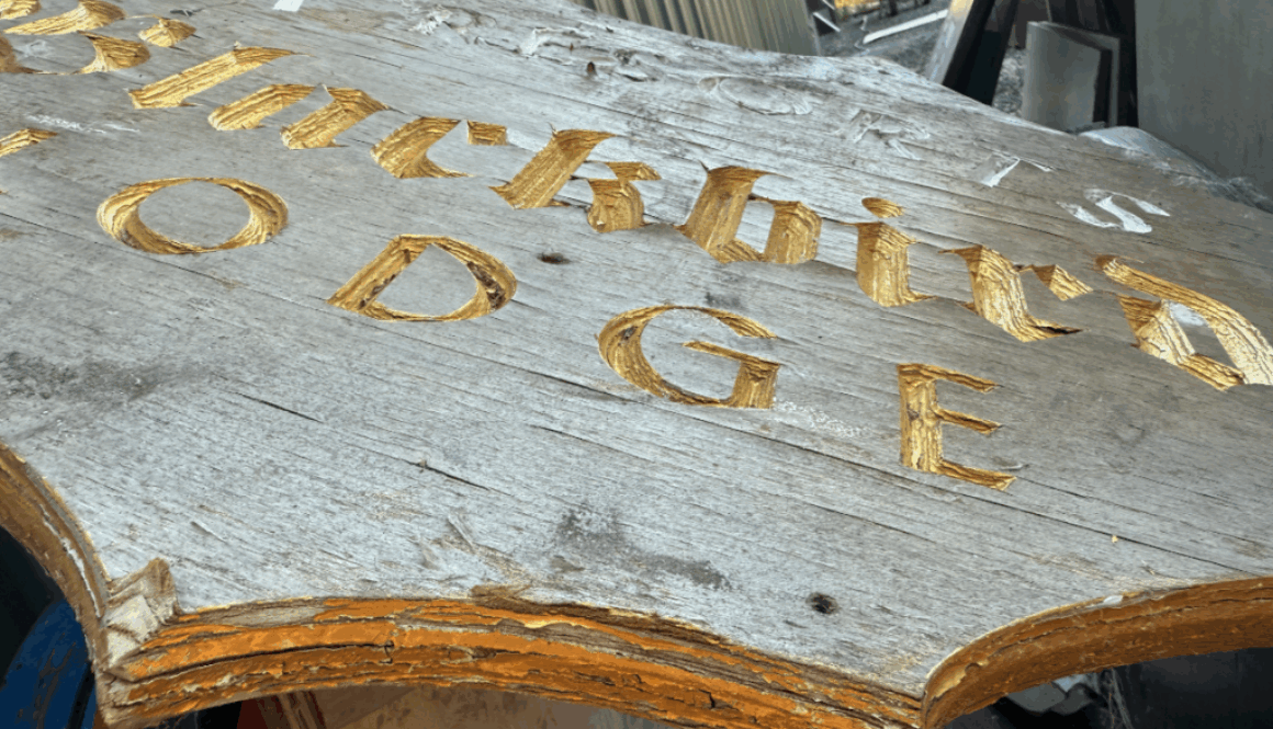 aged edges of a plywood sign