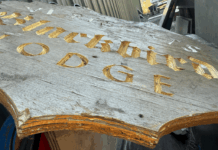 aged edges of a plywood sign