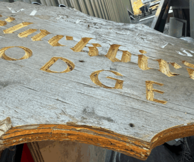 aged edges of a plywood sign
