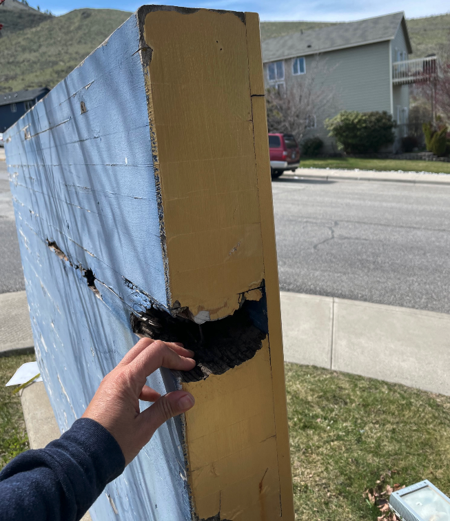 wooden sign with rot